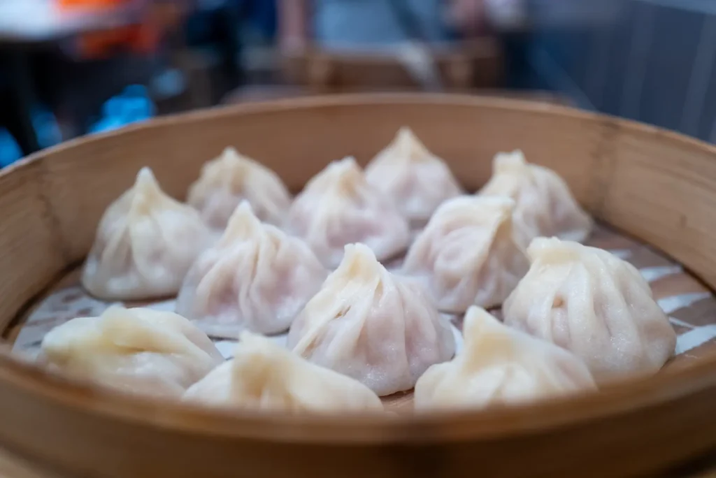 A steamer basket full of Xiaolongbao dumplings at Jia Jia Tang Bao in Shanghai